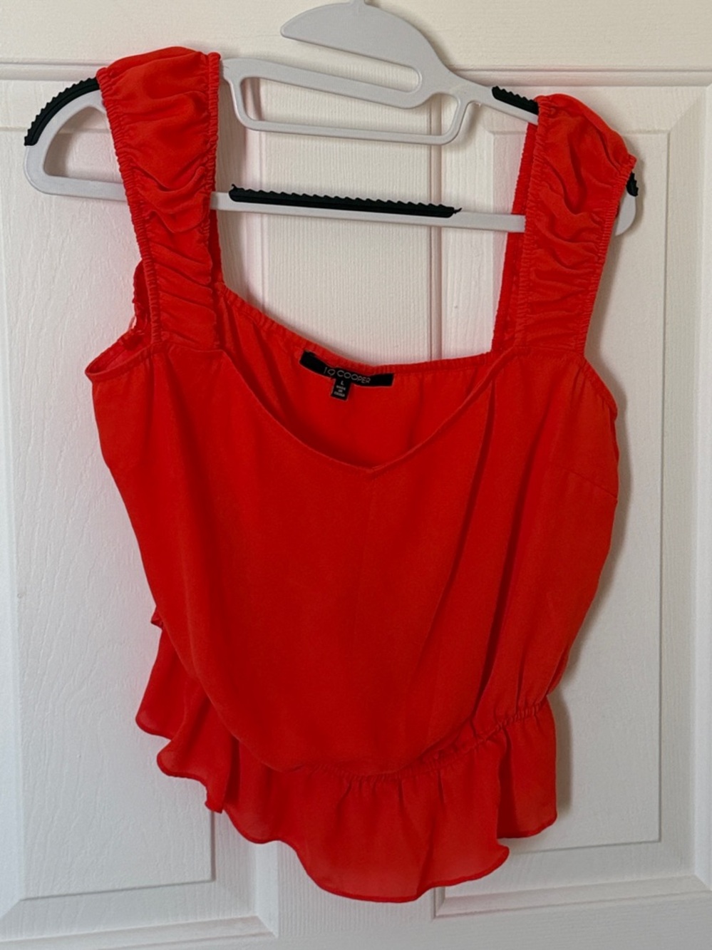 Red Ruffle-Hem Sleeveless Blouse